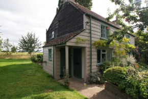 Cozy cottage overlooking fields, Upwell